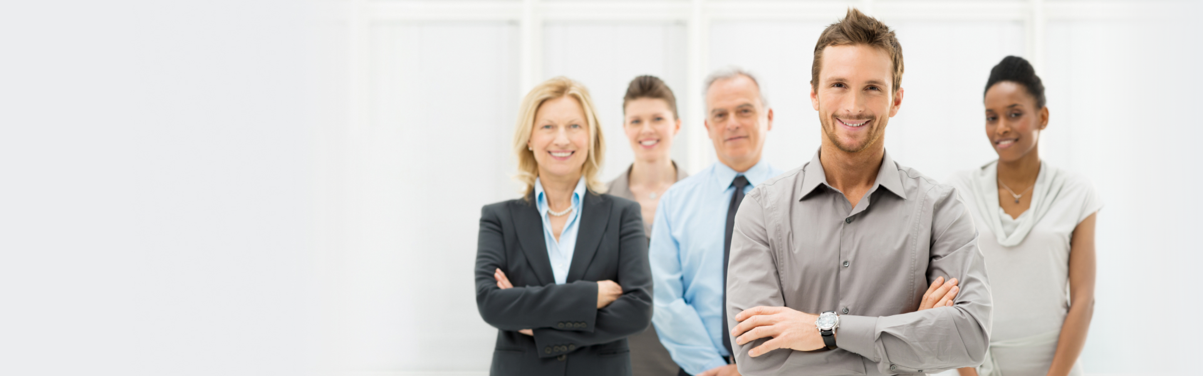 Portrait of a young businessman with a business team