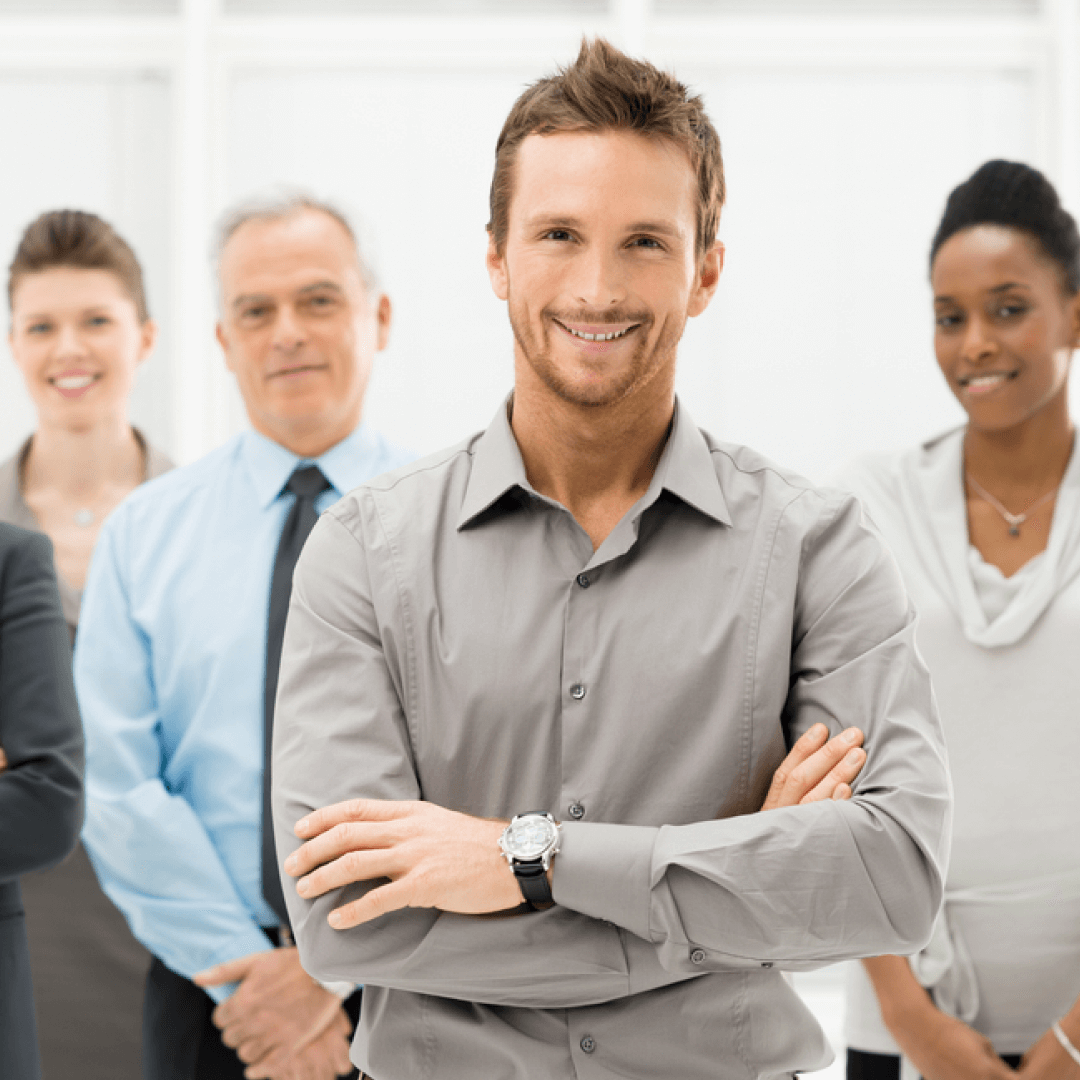 Portrait of a young businessman with a business team